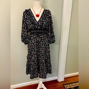 Beautiful prairie style puffy sleeved ruffled dress!